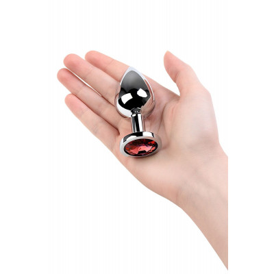 Серебристая коническая анальная пробка с красным кристаллом - 8 см. Серебристая коническая анальная пробка с красным кристаллом - 8 см.