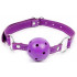 Фиолетовый кляп-шарик на регулируемом ремешке с кольцами Фиолетовый кляп-шарик на регулируемом ремешке с кольцами