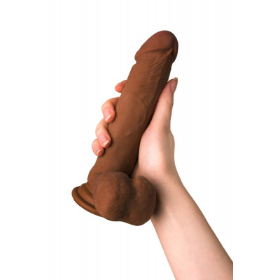 Коричневый вибратор-реалистик на присоске с пультом ДУ - 21 см. Коричневый вибратор-реалистик на присоске с пультом ДУ - 21 см.