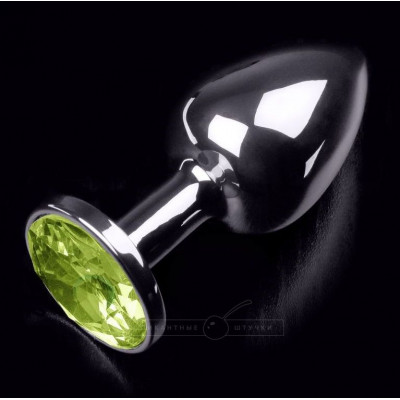 Маленькая серебристая анальная пробка с желтым кристаллом - 7 см. Маленькая серебристая анальная пробка с желтым кристаллом - 7 см.