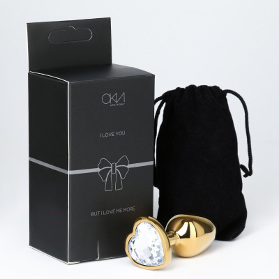 Золотистая анальная пробка с прозрачным кристаллом в форме сердца Золотистая анальная пробка с прозрачным кристаллом в форме сердца