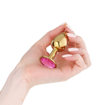 Золотистая анальная пробка с розовым кристаллом Золотистая анальная пробка с розовым кристаллом