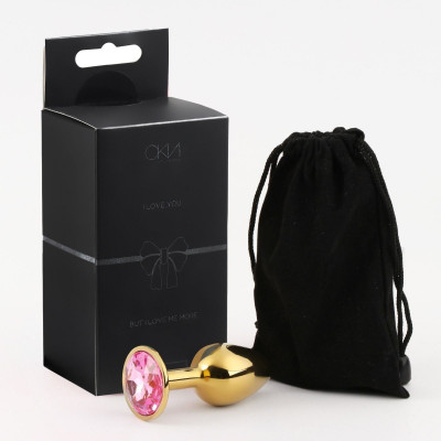 Золотистая анальная пробка с розовым кристаллом Золотистая анальная пробка с розовым кристаллом