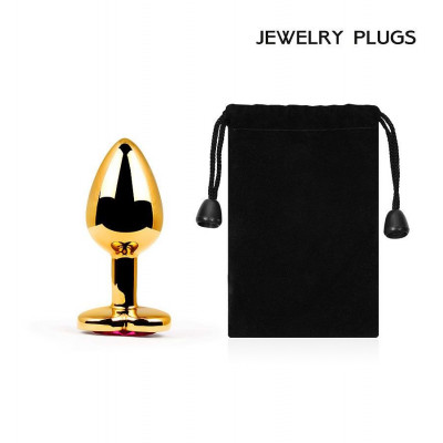 Золотистая анальная пробка с малиновым кристаллом-сердечком - 7 см. Золотистая анальная пробка с малиновым кристаллом-сердечком - 7 см.