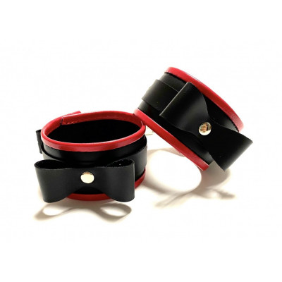 Черно-красные наручники с бантиками из эко-кожи Черно-красные наручники с бантиками из эко-кожи