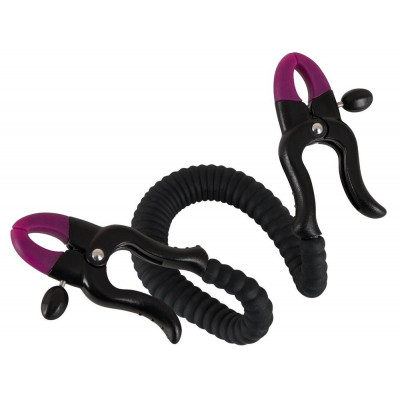 Зажим на половые губы с гибкой перемычкой для G-стимуляции Зажим на половые губы с гибкой перемычкой для G-стимуляции