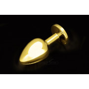 Большая золотая анальная пробка с закругленным кончиком и фиолетовым кристаллом - 9 см.