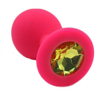 Розовая силиконовая анальная пробка с жёлтым кристаллом - 7 см. Розовая силиконовая анальная пробка с жёлтым кристаллом - 7 см.
