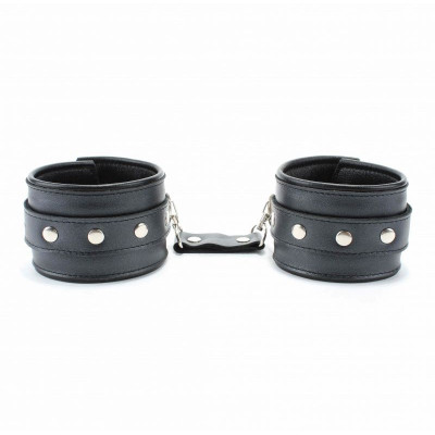 Черные кожаные наручники с металлическими клепками Черные кожаные наручники с металлическими клепками