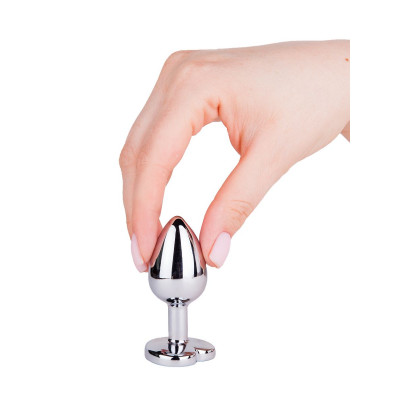 Серебристая анальная втулка с синим кристаллом-сердцем - 7 см. Серебристая анальная втулка с синим кристаллом-сердцем - 7 см.